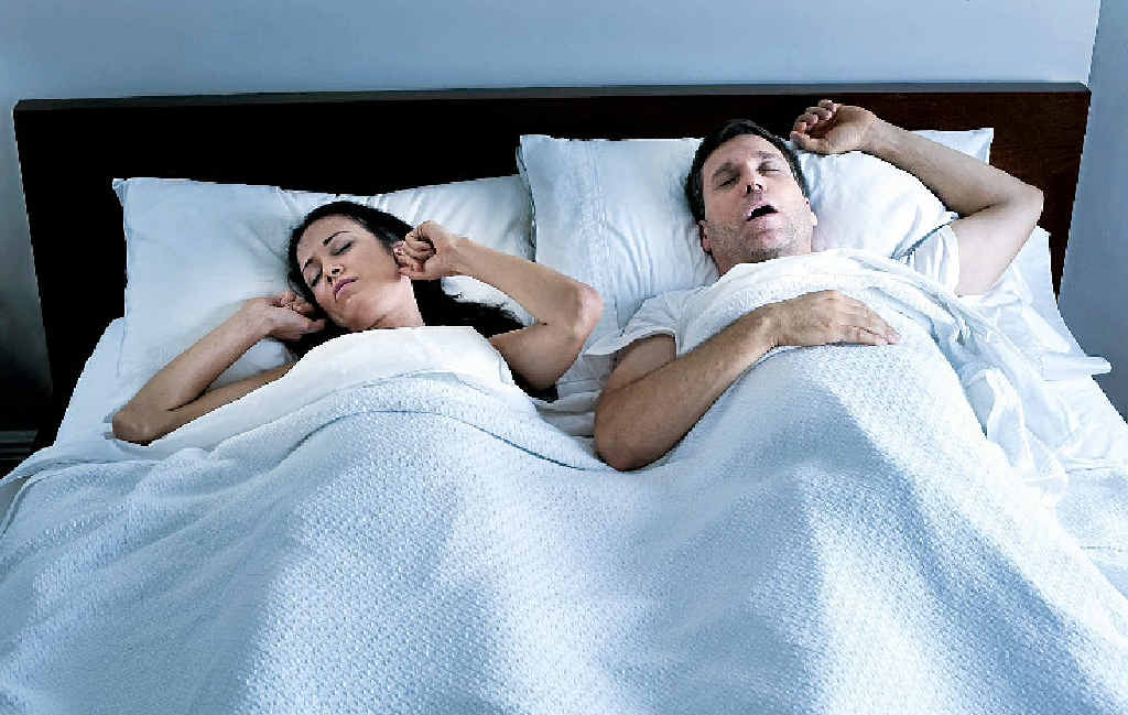 Cuddling up to your partner is a no-no, even if they don't snore. Cuddling up to your partner is a no-no, even if they don't snore.